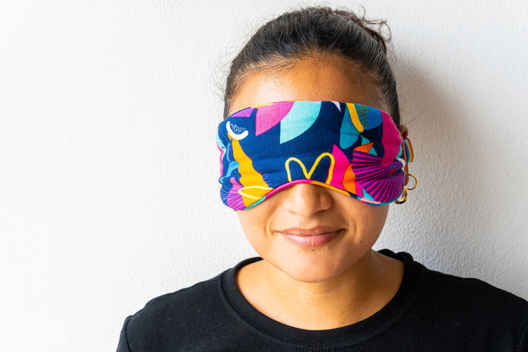 Model wearing Kip and Boo Bamboo Cancun Print Eyemask Bright Tropical Colours